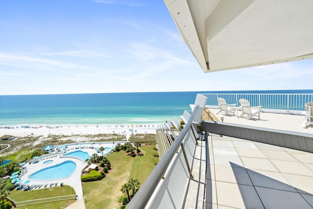 291 Scenic Gulf Dr Unit 1405, Miramar Beach, FL 32550 - balcony featuring a view of the beach and a water view