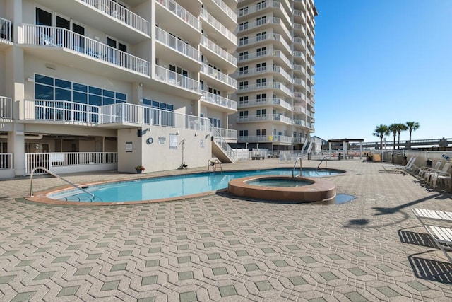 8575 Gulf Blvd Unit 1402, Navarre, FL 32566 - community pool featuring a community hot tub