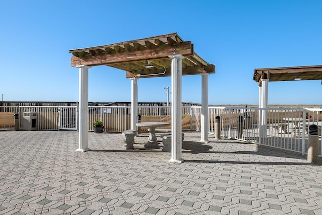 8575 Gulf Blvd Unit 1402, Navarre, FL 32566 - view of patio with fence and a pergola