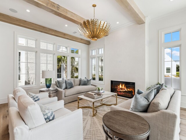 267 Tyler Dr, Santa Rosa Beach, FL 32459 - living room with wood finished floors, plenty of natural light, and beam ceiling