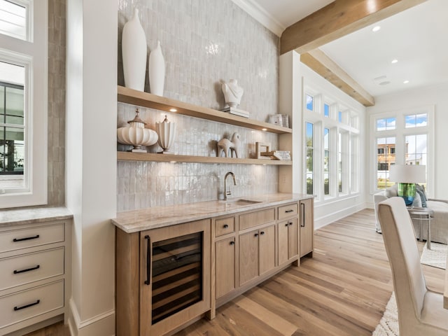 267 Tyler Dr, Santa Rosa Beach, FL 32459 - bar featuring wine cooler, a sink, backsplash, light wood-style flooring, and indoor wet bar