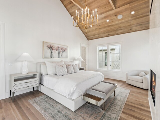 267 Tyler Dr, Santa Rosa Beach, FL 32459 - bedroom with wooden ceiling, high vaulted ceiling, a chandelier, and wood finished floors
