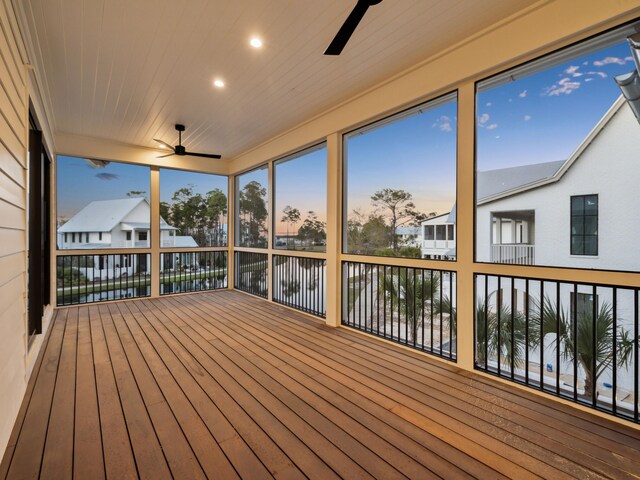 267 Tyler Dr, Santa Rosa Beach, FL 32459 - unfurnished sunroom featuring a residential view and a ceiling fan