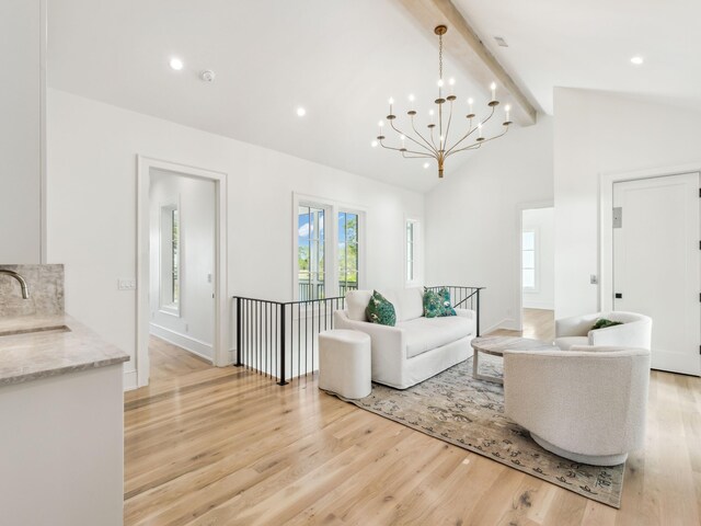 267 Tyler Dr, Santa Rosa Beach, FL 32459 - living room featuring recessed lighting, a chandelier, light wood-style floors, and beamed ceiling