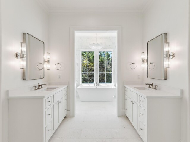 267 Tyler Dr, Santa Rosa Beach, FL 32459 - full bath with a sink, crown molding, and two vanities