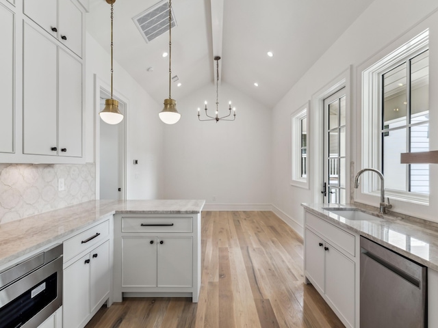267 Tyler Dr, Santa Rosa Beach, FL 32459 - kitchen featuring decorative backsplash, lofted ceiling with beams, visible vents, a sink, and stainless steel dishwasher