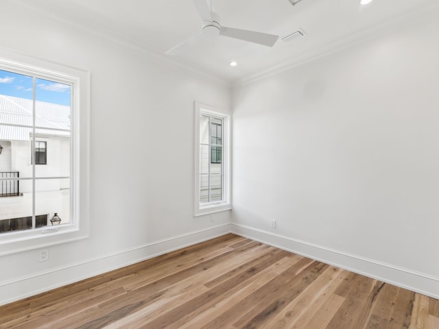 267 Tyler Dr, Santa Rosa Beach, FL 32459 - empty room with light wood-type flooring, ornamental molding, baseboards, visible vents, and a ceiling fan