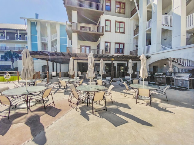 view of property's community featuring a pergola