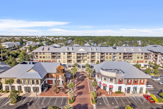 birds eye view of property with a residential view