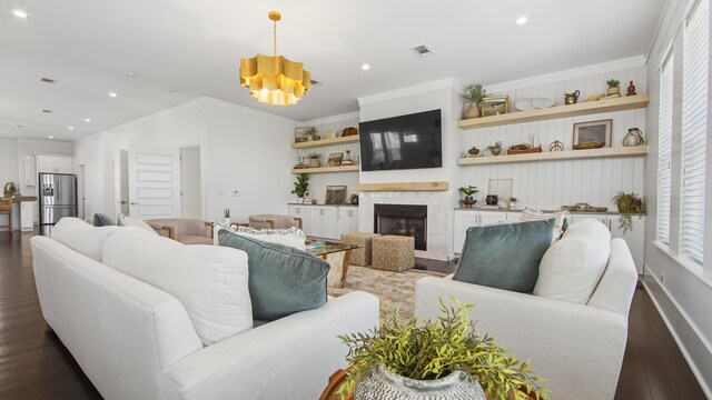294 Gulfview Cir, Santa Rosa Beach, FL 32459 - living area with visible vents, ornamental molding, recessed lighting, a fireplace, and dark wood-style flooring