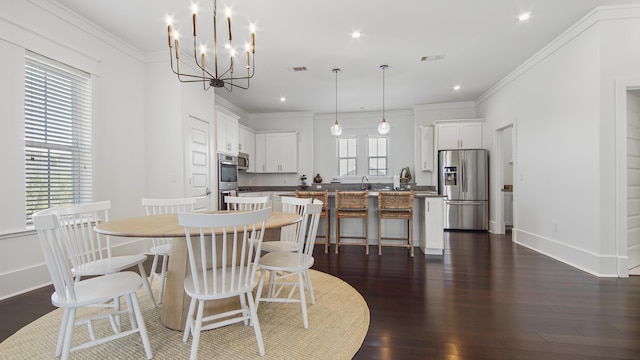 294 Gulfview Cir, Santa Rosa Beach, FL 32459 - dining space featuring visible vents, baseboards, dark wood-type flooring, crown molding, and a notable chandelier