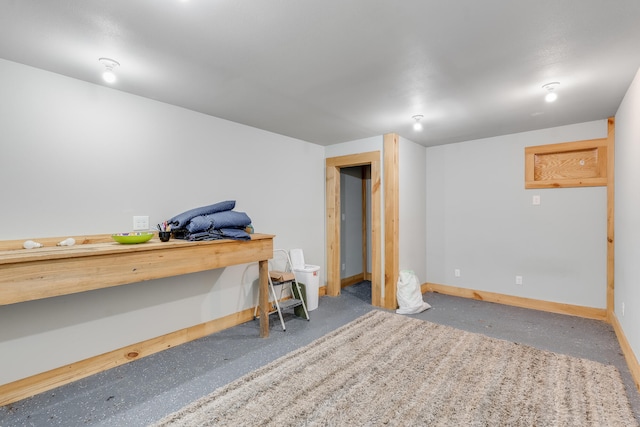 basement featuring baseboards