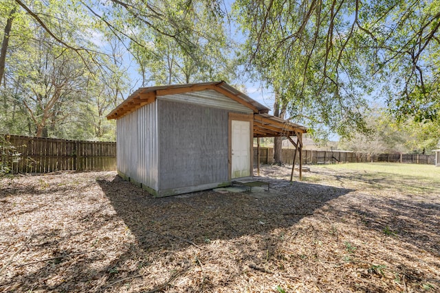 view of shed featuring a fenced backyard