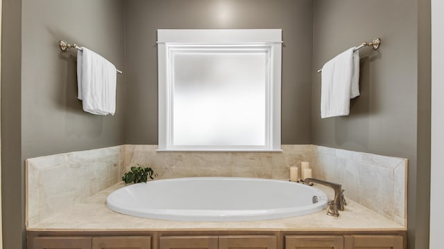 full bathroom with a bath