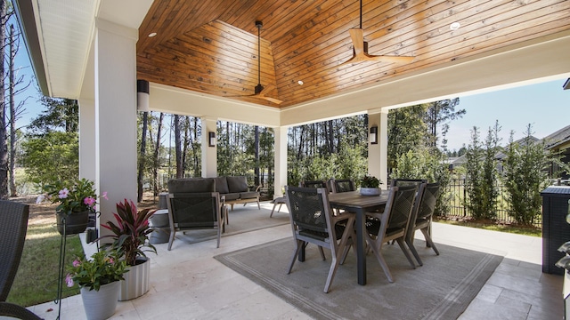 view of patio / terrace with an outdoor living space, a gazebo, outdoor dining area, and fence