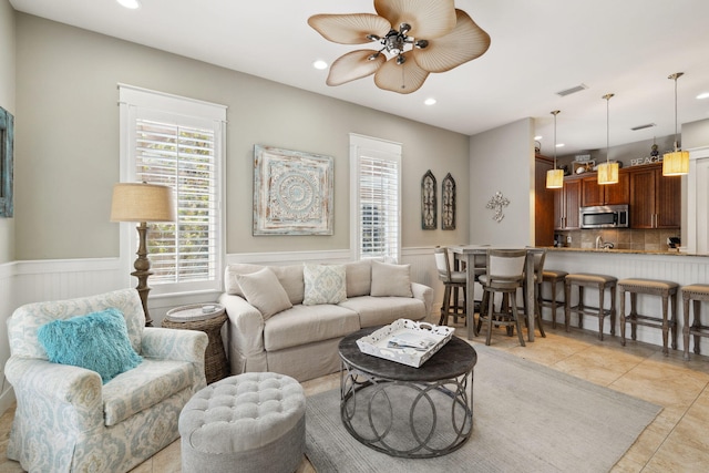 26 Classic Court Ln, Santa Rosa Beach, FL 32459 - living room featuring visible vents, recessed lighting, wainscoting, and a ceiling fan
