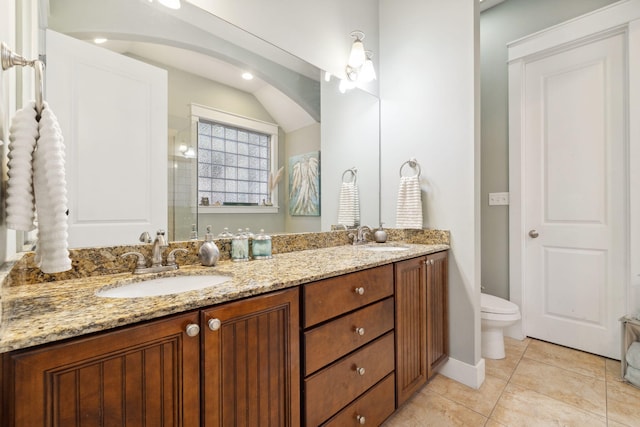 26 Classic Court Ln, Santa Rosa Beach, FL 32459 - bathroom with toilet, tile patterned floors, double vanity, and a sink
