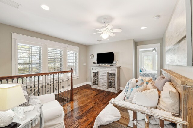 26 Classic Court Ln, Santa Rosa Beach, FL 32459 - living room with visible vents, baseboards, a ceiling fan, and wood finished floors
