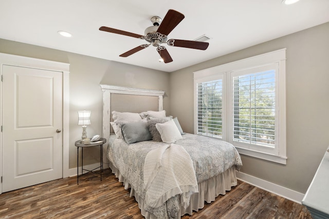 26 Classic Court Ln, Santa Rosa Beach, FL 32459 - bedroom with visible vents, baseboards, a ceiling fan, dark wood finished floors, and recessed lighting
