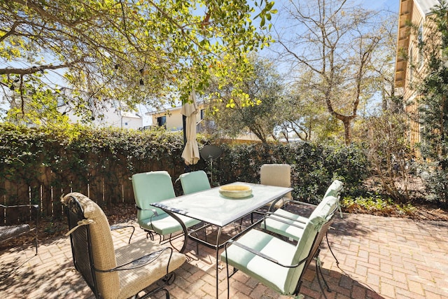 26 Classic Court Ln, Santa Rosa Beach, FL 32459 - view of patio / terrace featuring outdoor dining area and fence private yard