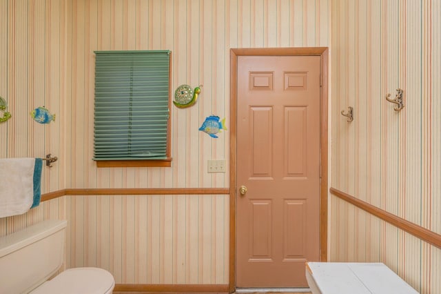 24776 Fifth Ave, Florala, AL 36442 - bathroom with wallpapered walls and toilet