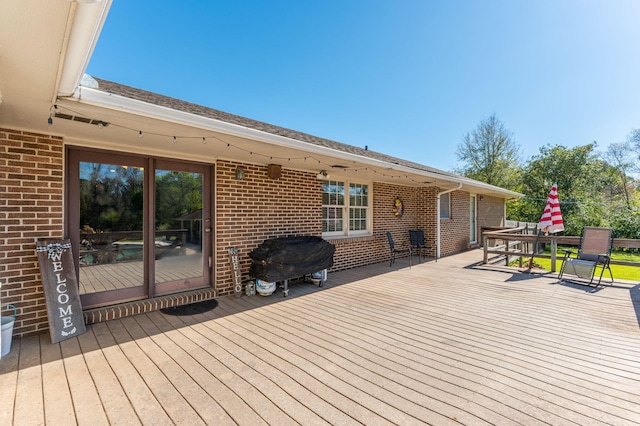 24776 Fifth Ave, Florala, AL 36442 - wooden terrace with a grill