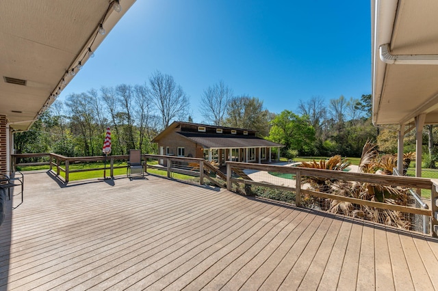 24776 Fifth Ave, Florala, AL 36442 - deck featuring an outbuilding