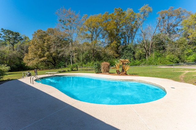 24776 Fifth Ave, Florala, AL 36442 - outdoor pool featuring a patio area, a lawn, and fence