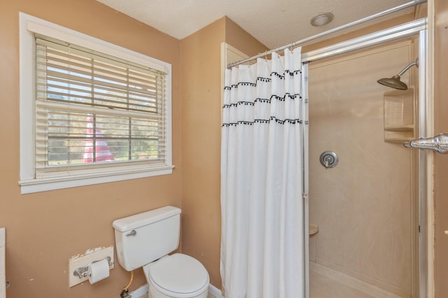 24776 Fifth Ave, Florala, AL 36442 - full bathroom featuring curtained shower, toilet, and a textured ceiling