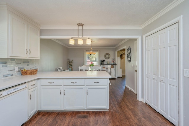 24776 Fifth Ave, Florala, AL 36442 - kitchen with dishwasher, a peninsula, white cabinets, and dark wood-style flooring