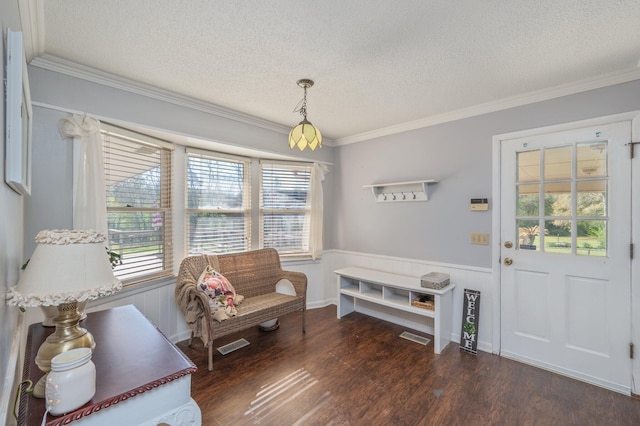 24776 Fifth Ave, Florala, AL 36442 - sitting room featuring ornamental molding, wood finished floors, a wainscoted wall, and a textured ceiling