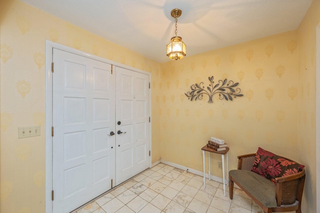 24776 Fifth Ave, Florala, AL 36442 - foyer featuring wallpapered walls and baseboards