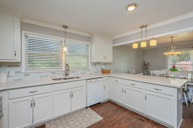 24776 Fifth Ave, Florala, AL 36442 - kitchen with dark wood finished floors, dishwasher, a peninsula, white cabinetry, and a sink