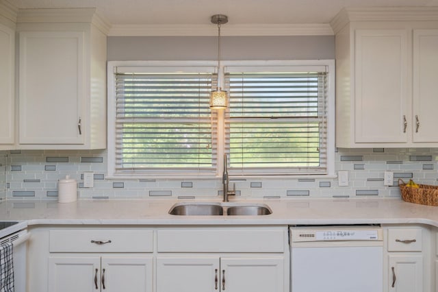 24776 Fifth Ave, Florala, AL 36442 - kitchen with a sink, white cabinetry, white appliances, crown molding, and decorative backsplash