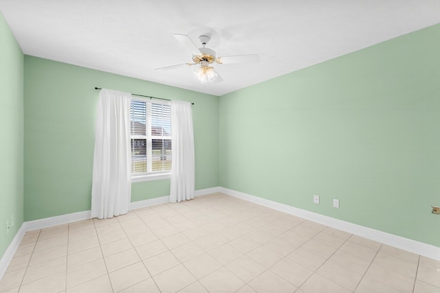 2511 Parkwood Dr, Panama City, FL 32405 - spare room featuring baseboards and ceiling fan