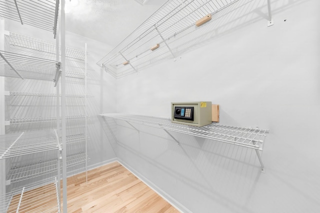 2511 Parkwood Dr, Panama City, FL 32405 - walk in closet featuring wood finished floors