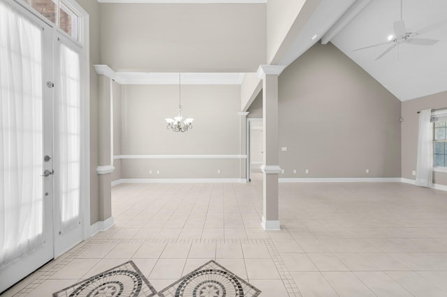 2511 Parkwood Dr, Panama City, FL 32405 - entryway featuring light tile patterned floors, ceiling fan with notable chandelier, baseboards, and high vaulted ceiling