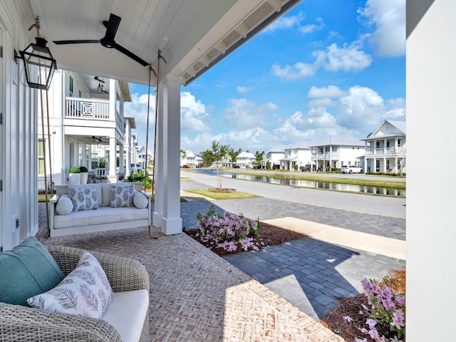 290 White Cottage Rd, Santa Rosa Beach, FL 32459 - view of patio with a residential view, a water view, and a porch