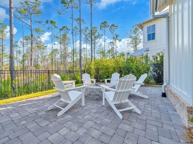290 White Cottage Rd, Santa Rosa Beach, FL 32459 - view of patio with a fire pit and fence