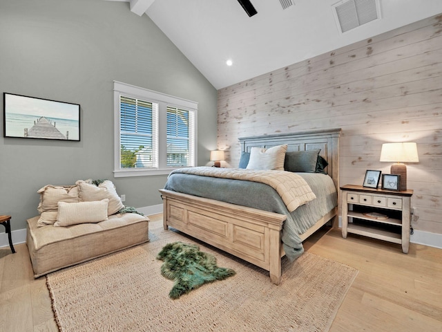 290 White Cottage Rd, Santa Rosa Beach, FL 32459 - bedroom with wooden walls, visible vents, beam ceiling, and high vaulted ceiling