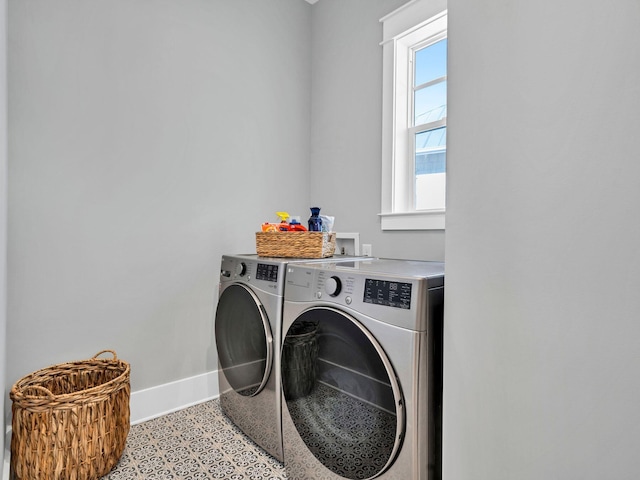 290 White Cottage Rd, Santa Rosa Beach, FL 32459 - clothes washing area with baseboards, laundry area, and independent washer and dryer
