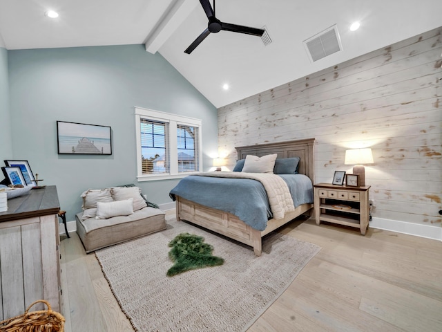290 White Cottage Rd, Santa Rosa Beach, FL 32459 - bedroom with beamed ceiling, visible vents, wood walls, and wood finished floors