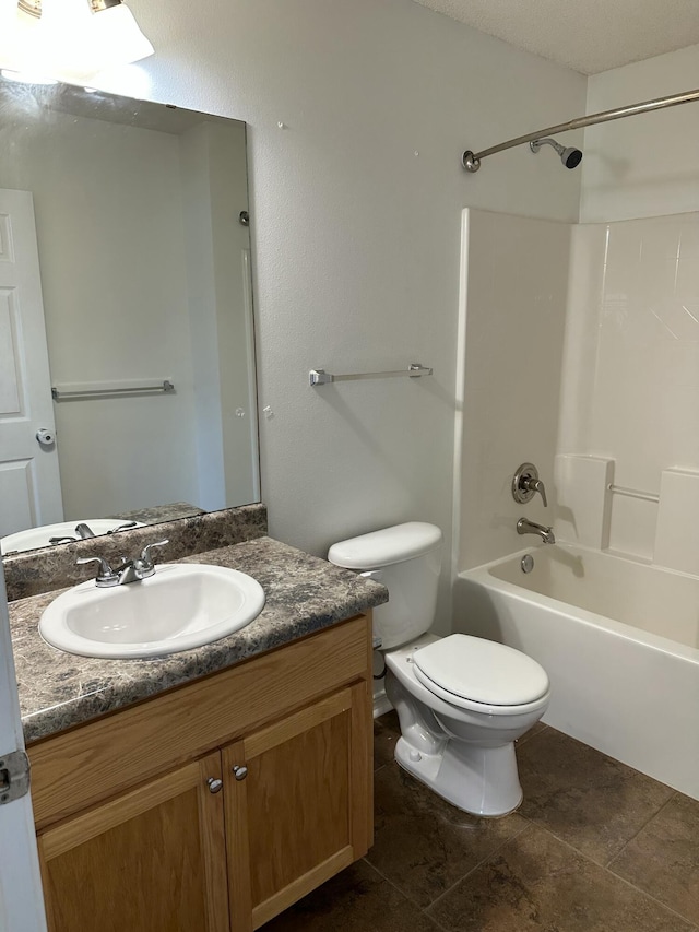 full bathroom with shower / tub combination, toilet, and vanity
