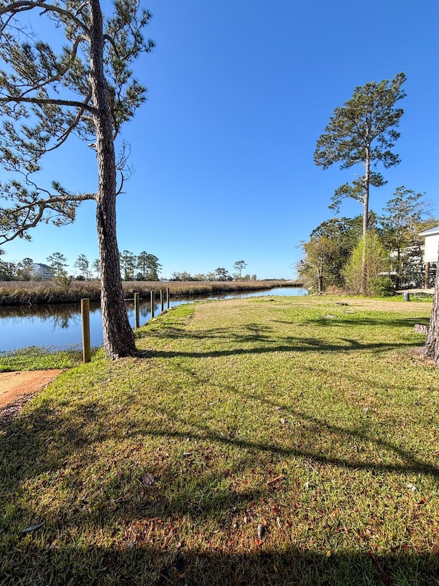 view of yard with a water view