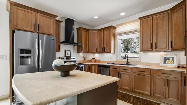 13 Taylor Krenkel Ct, Santa Rosa Beach, FL 32459 - kitchen with light countertops, a sink, wall chimney exhaust hood, brown cabinetry, and stainless steel appliances