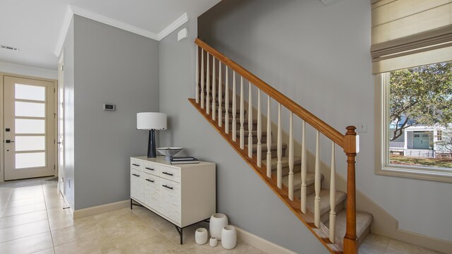 13 Taylor Krenkel Ct, Santa Rosa Beach, FL 32459 - staircase with baseboards, tile patterned flooring, and crown molding