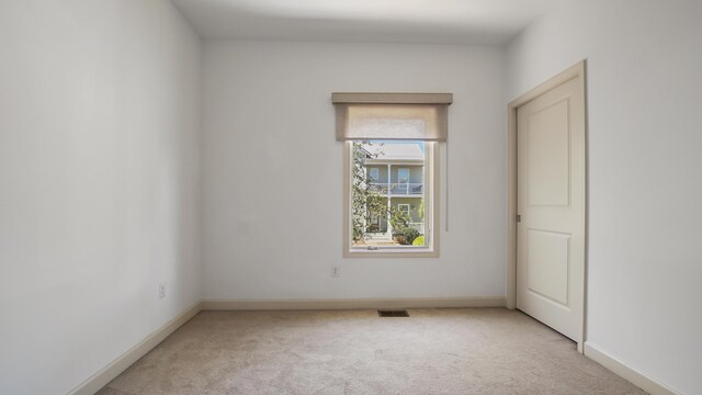 13 Taylor Krenkel Ct, Santa Rosa Beach, FL 32459 - empty room featuring light carpet, baseboards, and visible vents