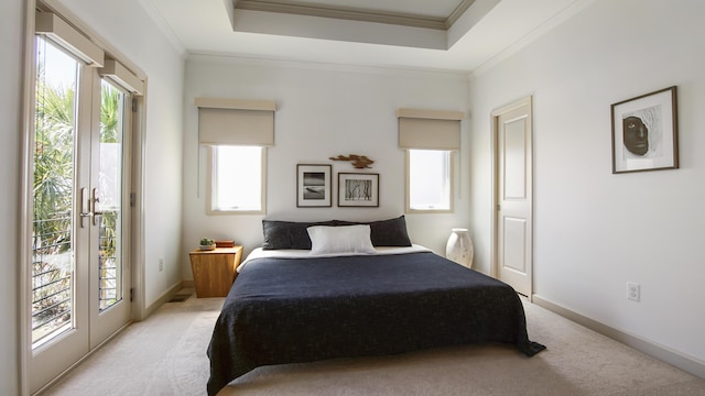 13 Taylor Krenkel Ct, Santa Rosa Beach, FL 32459 - bedroom with light carpet, a tray ceiling, access to exterior, and crown molding