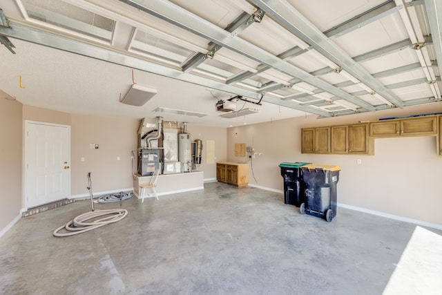 garage featuring water heater, a garage door opener, heating unit, and baseboards