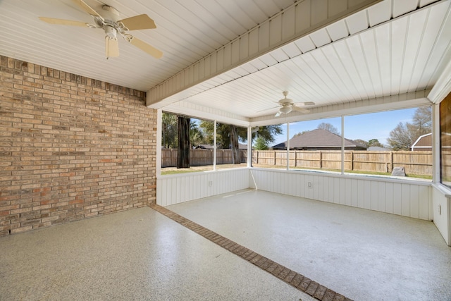view of patio with a fenced backyard and a ceiling fan